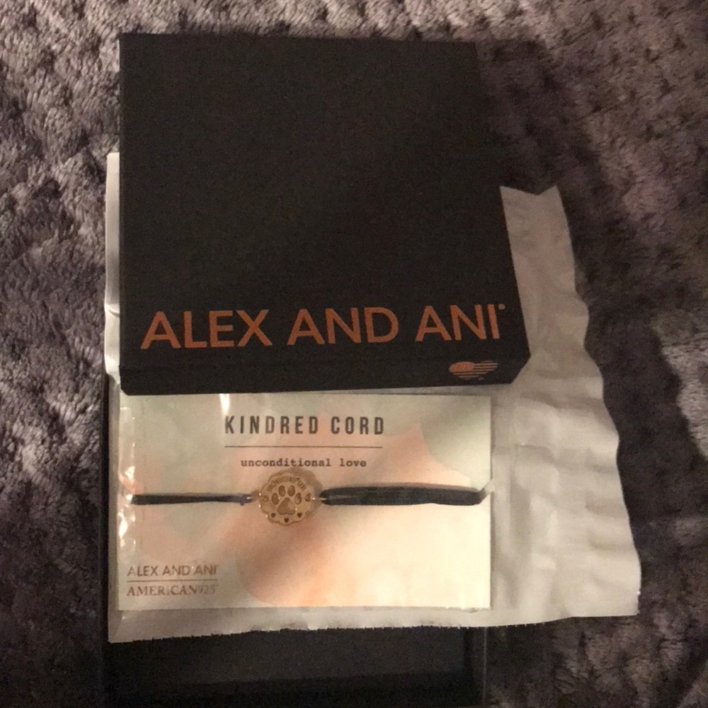 Never opened Alex and Ani bracelet.